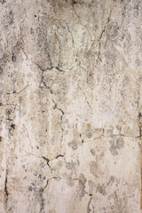 Old stucco wall texture of beige color