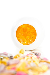 Pills spilling out of pill bottle