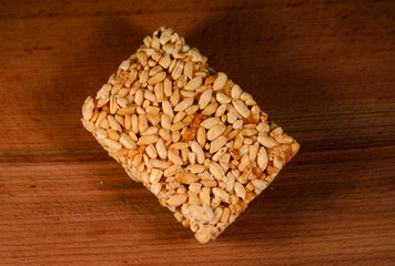 Caramel brittles on a wooden table