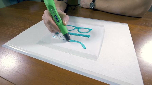 Technology of the future. 3D pen making products with plastic. 4K.