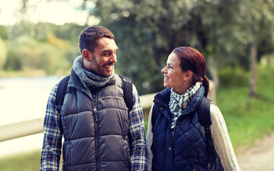 Fototapeta premium happy family walking with backpacks in woods