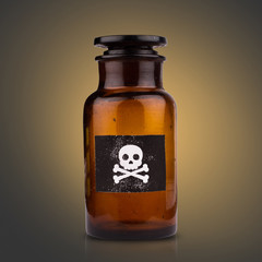 poison bottle on dark background