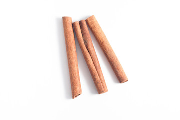 Cinnamon sticks on white background.