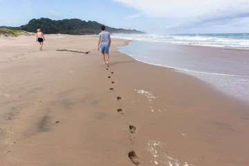 Girl Boy Footprints Walking Beach Ocean