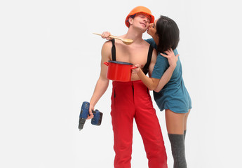 household couple of muscular man and woman holds pot, drill