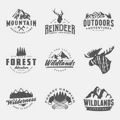 set of vintage hand drawn outdoor adventure badges and labels