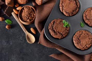 Chocolate muffins, brownies with nuts and chocolate.