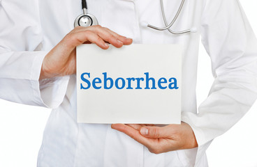 Seborrhea card in hands of Medical Doctor