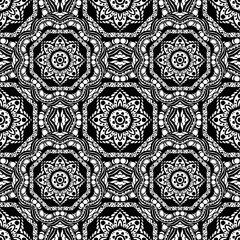 Seamless pattern with mandalas in black and white colors. Vector background.