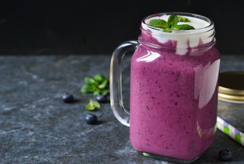 Detox drink - berry smoothie with yogurt, granola and honey.