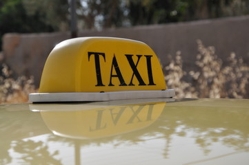 yellow Taxi sign