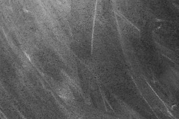 Chalk rubbed out on blackboard