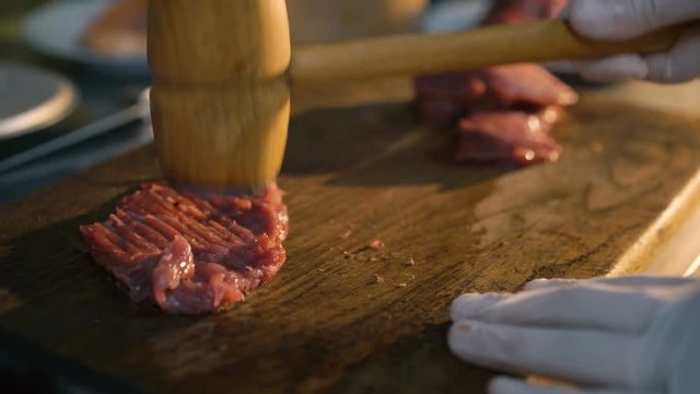 Chief cooking meat chops 4K
