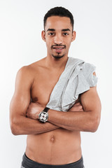 Fototapeta premium Handsome african man posing over white background