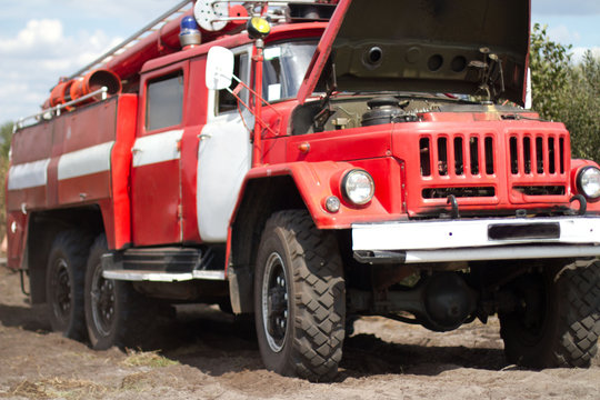 fire truck puts out in a field a forest firefire truck puts out