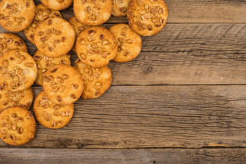 Cookies with peanut on old wooden table.
