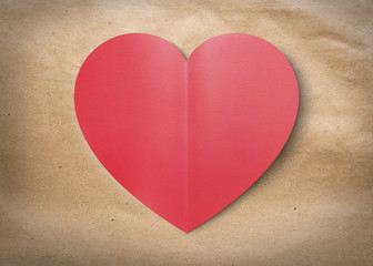 Red heart isolate card on brown paper for valentine's day