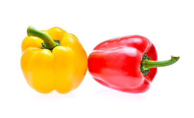 Yellow and red peppers isolated on white background