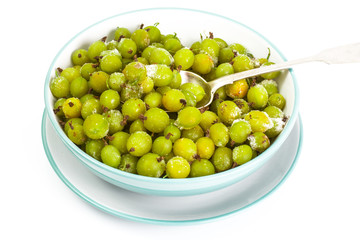 Frozen gooseberries on white