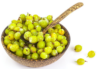Frozen gooseberries on white