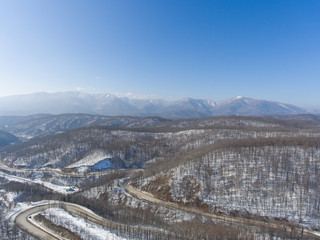 Aerial view of winter mountain road.