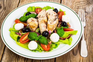 Fresh vegetables, tuna, olives and mozzarella