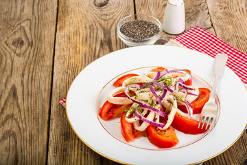 Salad with seafood, fresh vegetables and chia seeds