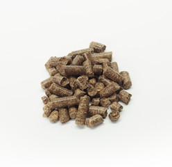 stack of wooden pellets for bio energy, white background, isolated