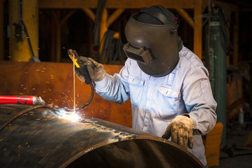 Welder at work site