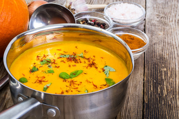 Dishes from pumpkin with saffron and basil