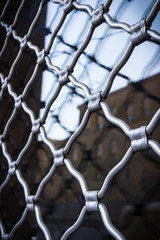 Fototapeta premium Beautiful window with forged bars