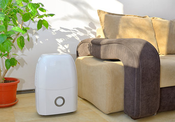Portable dehumidifier colect water from air - 135311863