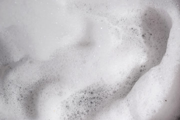 abstract background of white foam and bubbles.