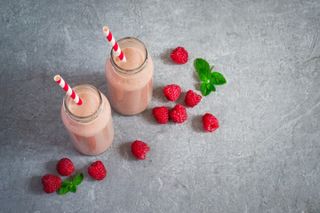 Obraz na płótnie Canvas Milk shake with raspberries and berries.