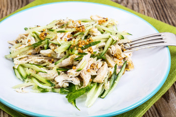Salad with cucumber, chicken and mustard