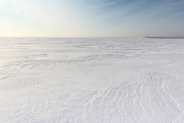 Fototapeta na wymiar Snow cover on the river in the winter, the River Ob, Siberia, Ru