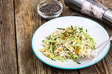 Chicken salad, fresh vegetables and chia seeds