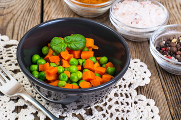 Mix boiled vegetables in a salad bowl