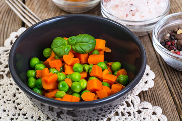 Mix boiled vegetables in a salad bowl