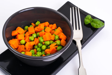 Mix boiled vegetables in a salad bowl