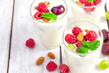 Homemade yoghurt with seasonal berries. Healthy natural dessert.