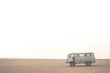 Car with tourists in desert on Olkhon island. Lake Baikal, Russian Siberia © Grigorii Postnikov