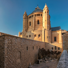 Fototapeta na wymiar Church of Dormition at sunset, the Orthodox Church of Jerusalem, located near Zion Gate outside the Old City. Israel.
