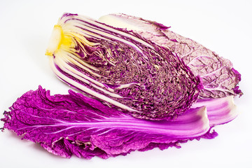 Fototapeta premium Red Chinese cabbage on a light background