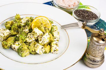 Salad with avocado, cheese, herbs and seeds of chia