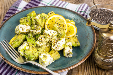 Salad with avocado, cheese, herbs and seeds of chia