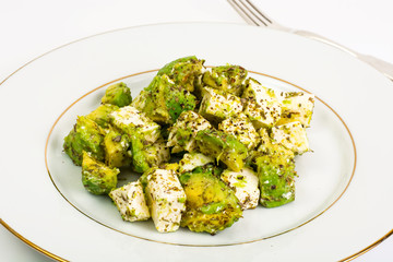 Salad with tofu, avocado and herbs