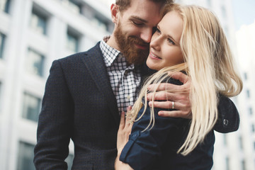 Love Story. The guy hugs the girl. Smile.