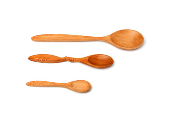 Three wooden spoons of different sizes.