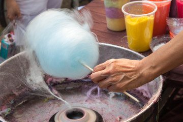 People are making cotton candy machine. - 135320052